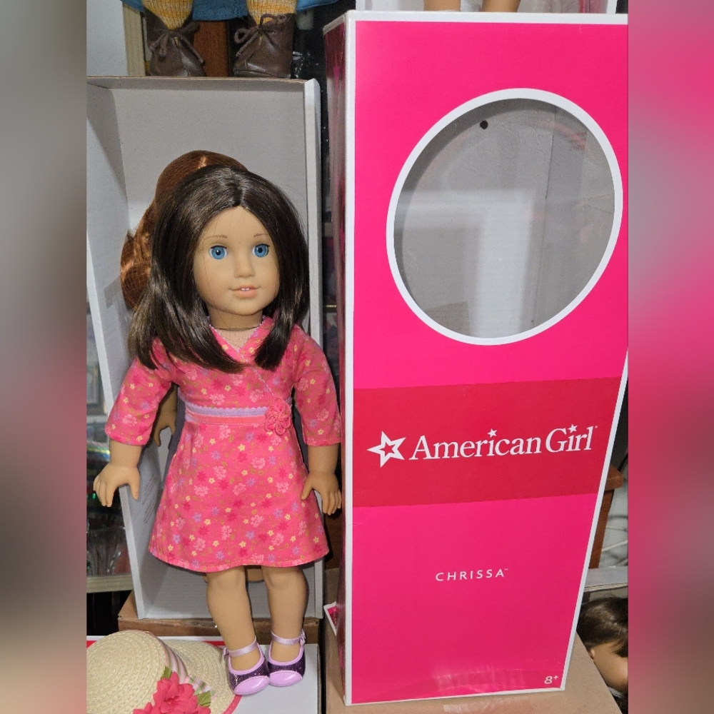 American girl doll Chrissa brown hair blue eyes